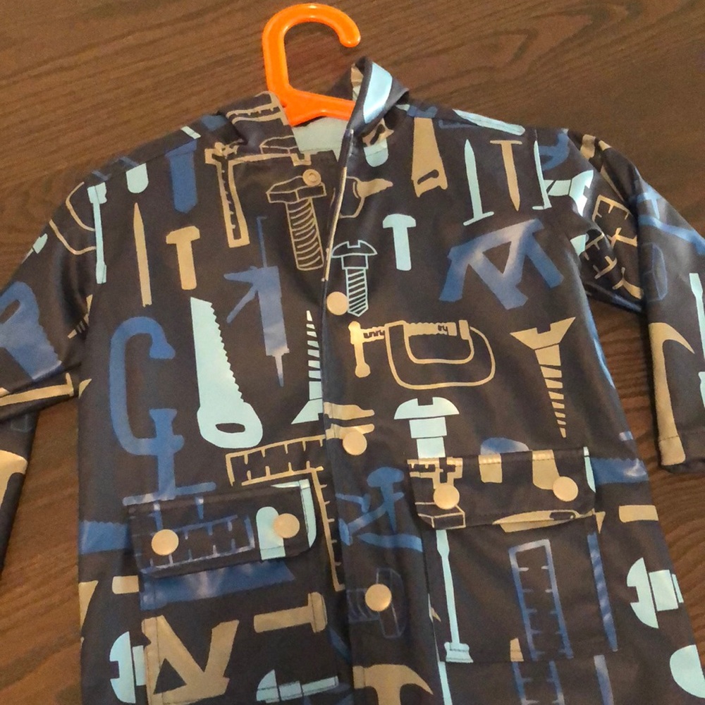 Kitestrings raincoat blue with builder tools print